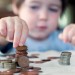 Child counting money Child counting money