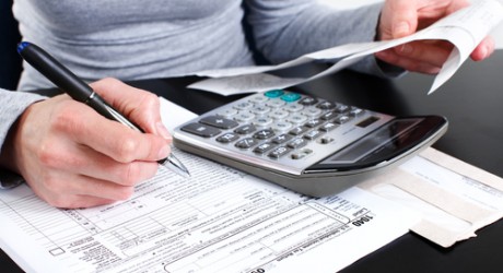 woman filling in a tax return
