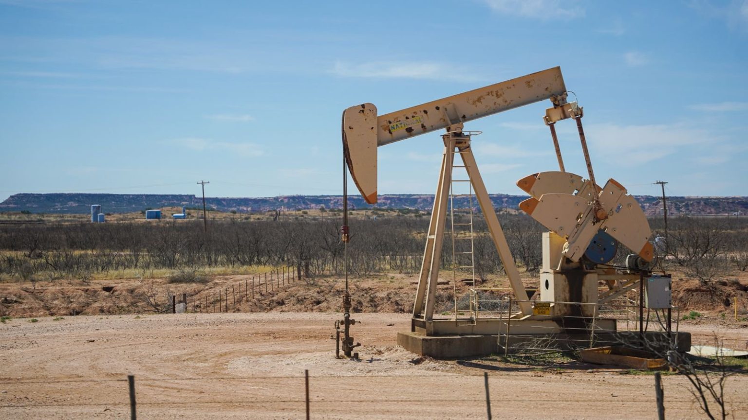 Oil pumpjack at an onshore oil production site