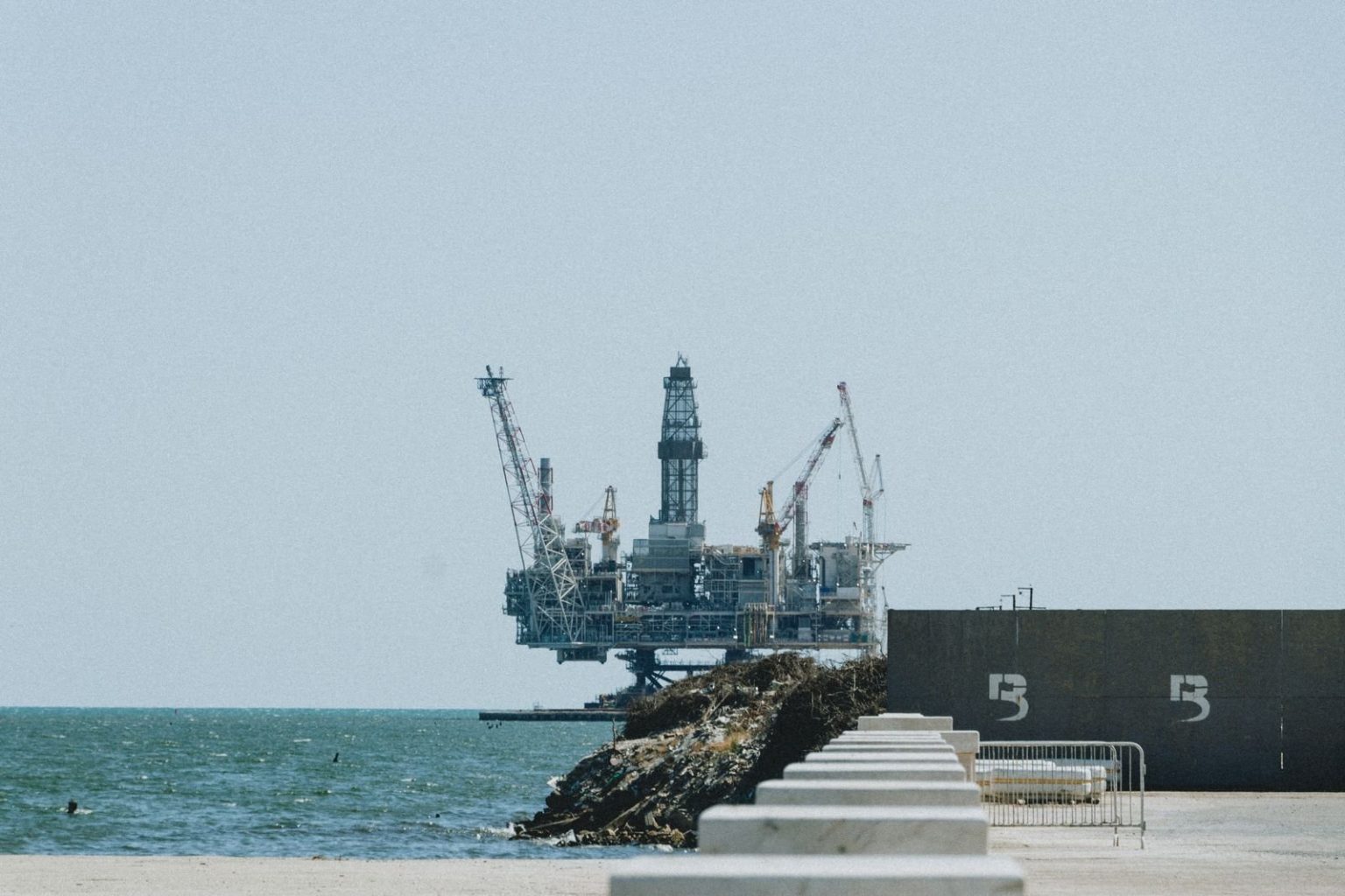 Jackdaw gas field approved by UK government, with gas supply possible from the end of October An offshore oil and gas platform with cranes at sea